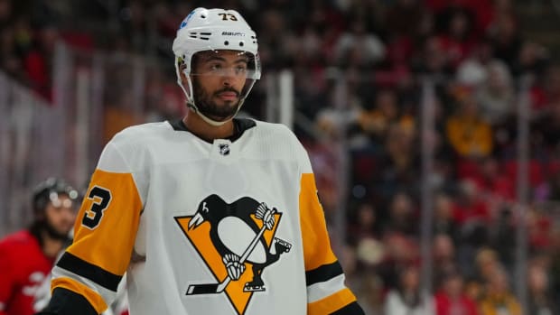 Pittsburgh Penguins defenseman Pierre-Olivier Joseph (73) looks on against the Carolina Hurricanes during the second period at PNC Arena.